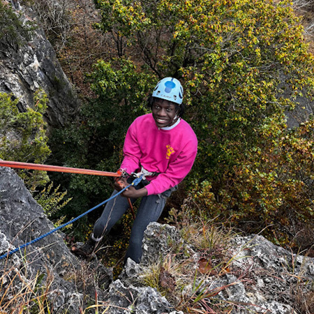 Eco-Act participant rock climbing