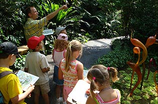 Instructor leading students through Climatron