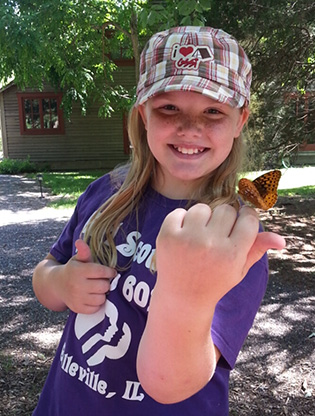 Girl scout with butterfly