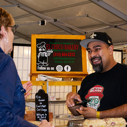 Vendor speaking with a customer