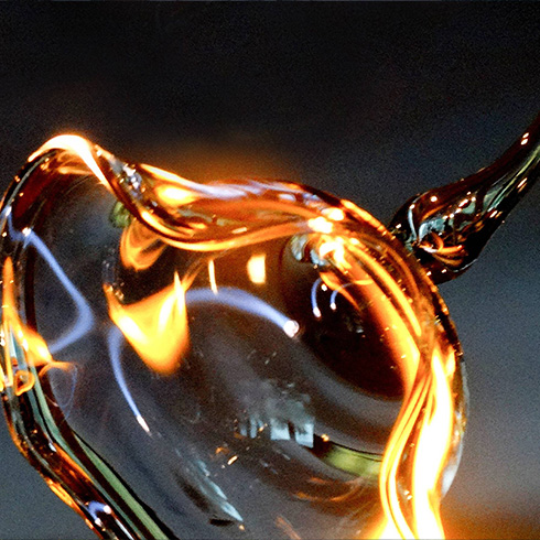 Blown glass being shaped
