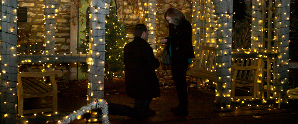Man proposing to woman at Garden Glow