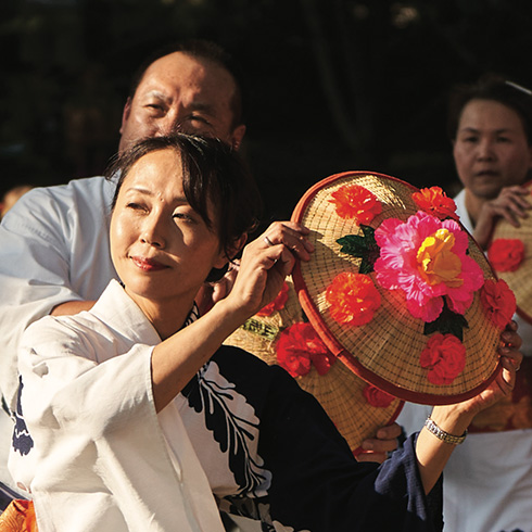 Performer with decorative fan