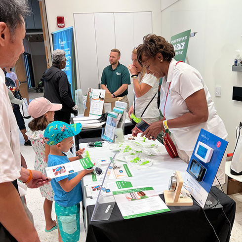 Exhibitor meeting with children