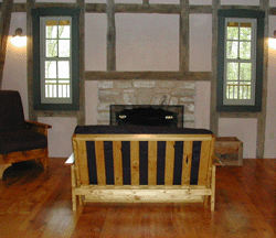 Futon and fireplace