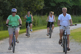 Adults enjoying an evening bike ride at SNR