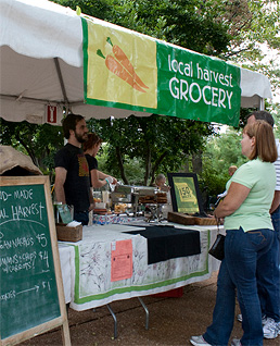 2011 Festival goers at Local Harvest kiosk