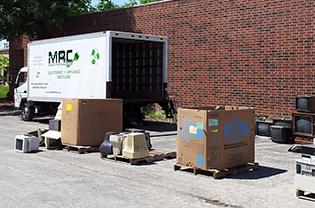 MRC truck picking up tvs and monitors