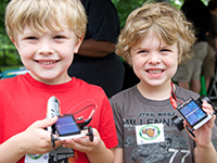 Boys show off their solar cars