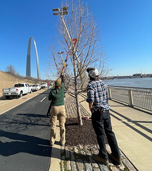 OLC participants work along the riverfront