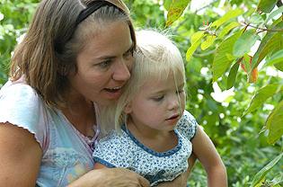 Mother and daughter in conservatory