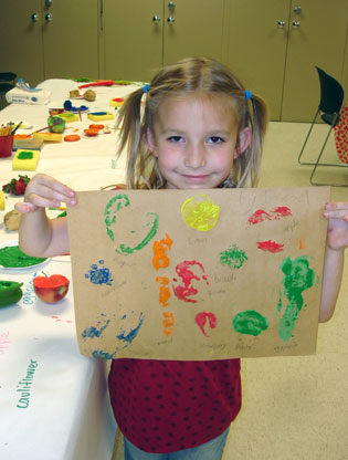 Girl with veggie prints