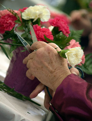 Participant arranging flowers