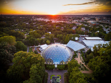 Arial view of Climatron and surrounding buildings with sunset
