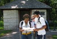 Hikers consulting a map