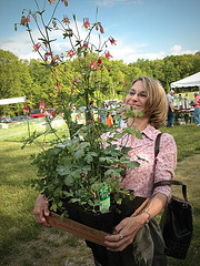 Woman with columbine purchased at the Wildflower Market