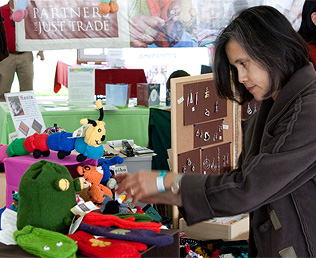 A shopper explores the many green items available at the festival