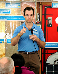 Speaker giving presentation on home energy efficiency