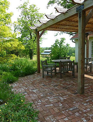 Brick laid over gravel bed